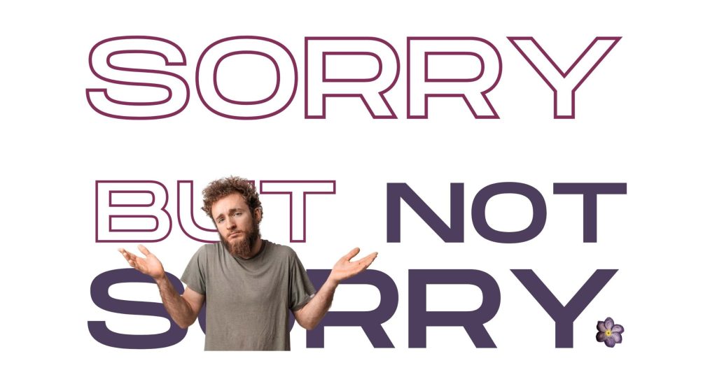 Große Buchstaben mit der Aufschrift "Sorry, but not Sorry" und einem Mann der die Haende in die Hoehe haelt